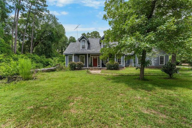 21818 Big River Drive, Magnolia, TX 77355