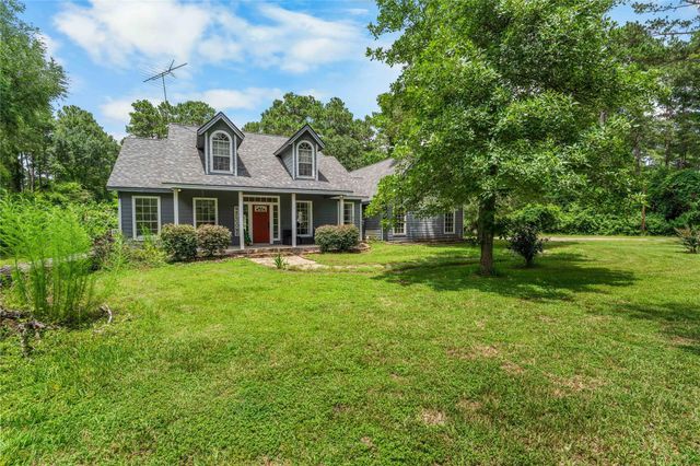 21818 Big River Drive, Magnolia, TX 77355