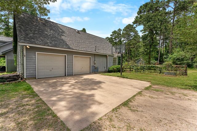 21818 Big River Drive, Magnolia, TX 77355