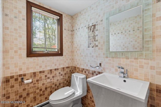 9 Manor Court, Manalapan, NJ 07726