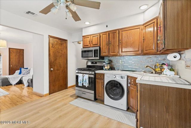 9 Manor Court, Manalapan, NJ 07726