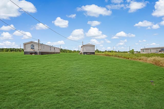 349 Road 591524, Cleveland, TX 77327