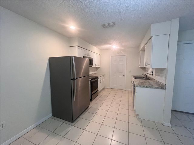 73 PROVIDENCE LANE A, Palm Coast, FL 32164