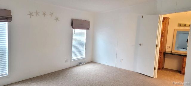 443 Pond View Drive, Morrice Village, MI 48857