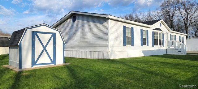 443 Pond View Drive, Morrice Village, MI 48857