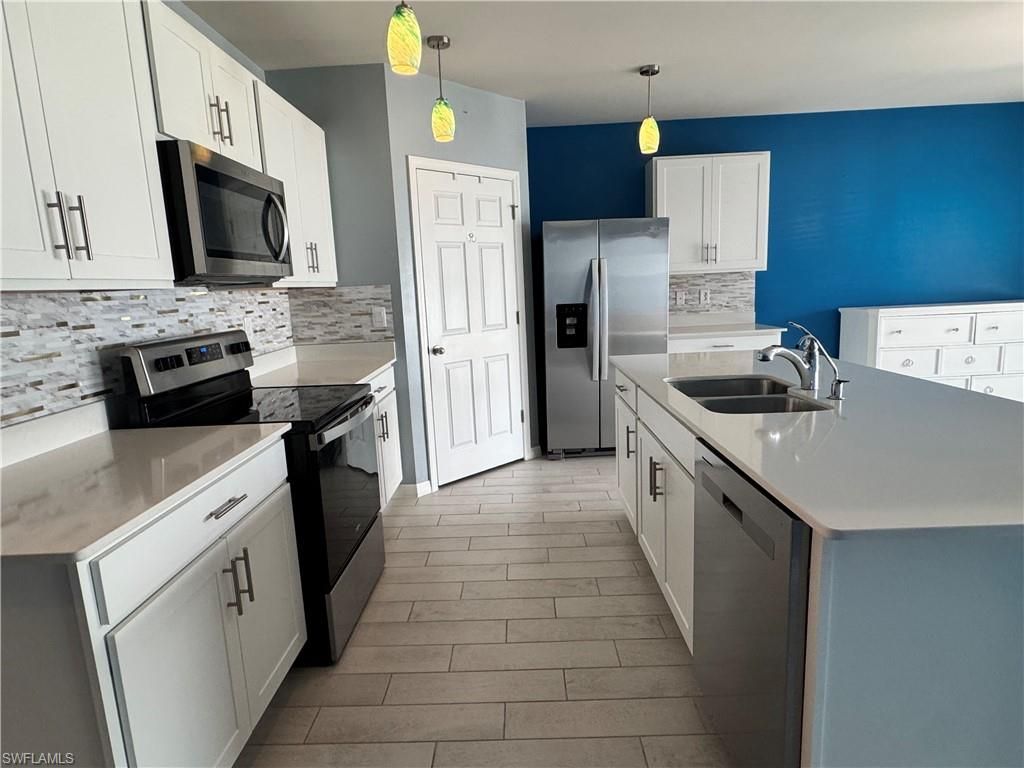 Image 5 of property listing at 2430 NW 9th TER, Cape Coral, FL 33993