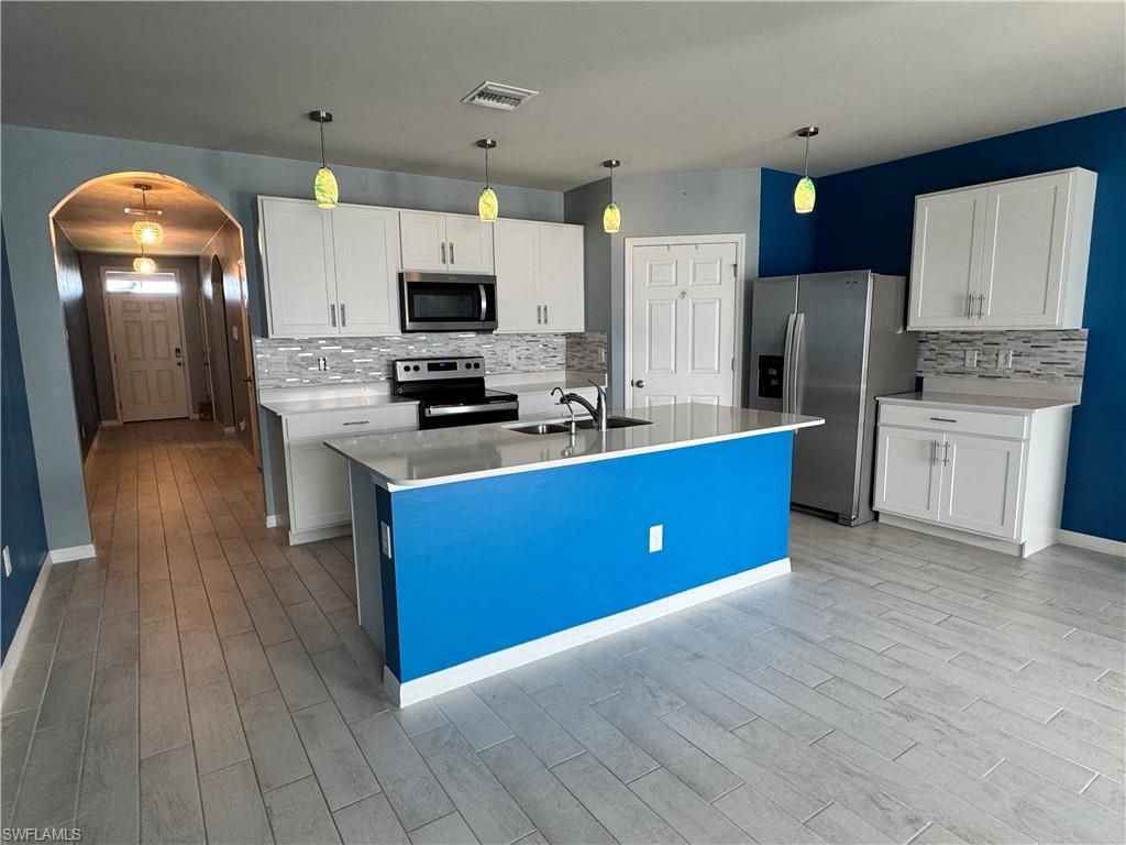 Image 6 of property listing at 2430 NW 9th TER, Cape Coral, FL 33993