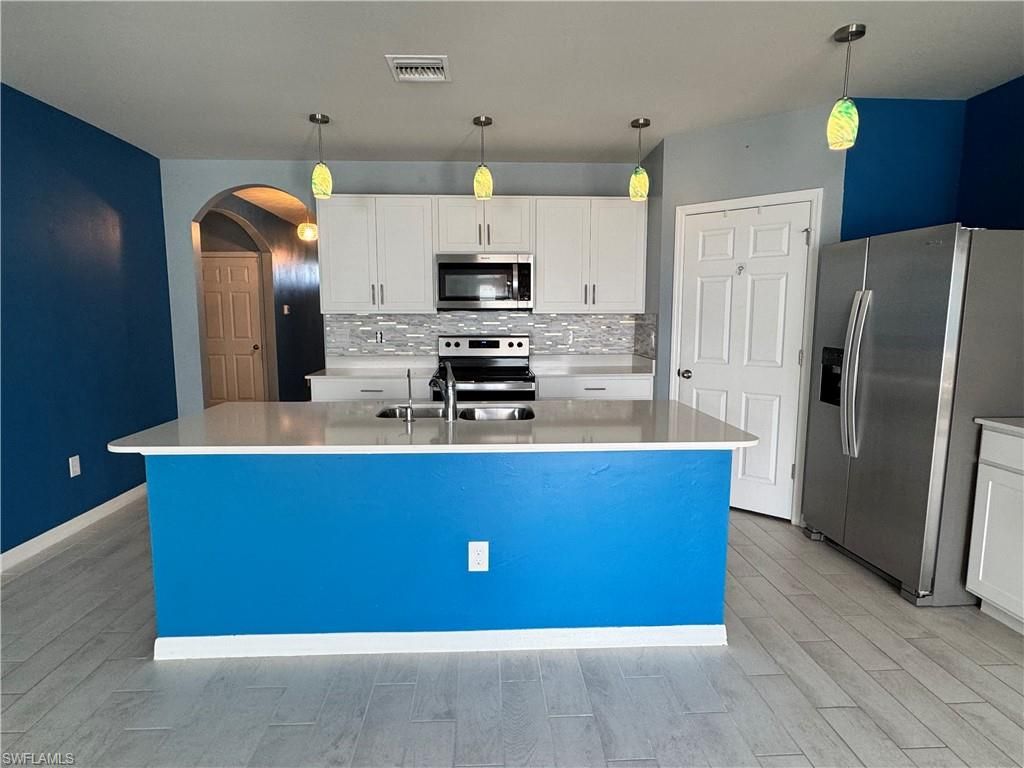 Image 8 of property listing at 2430 NW 9th TER, Cape Coral, FL 33993