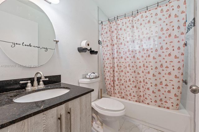 15723 Woodgate Pl E, Sunrise, FL 33326
