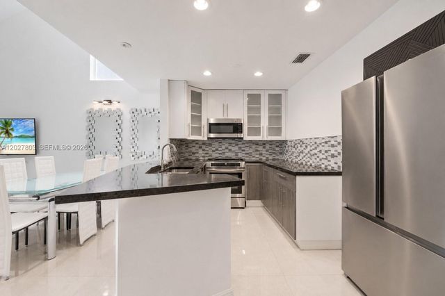 15723 Woodgate Pl E, Sunrise, FL 33326