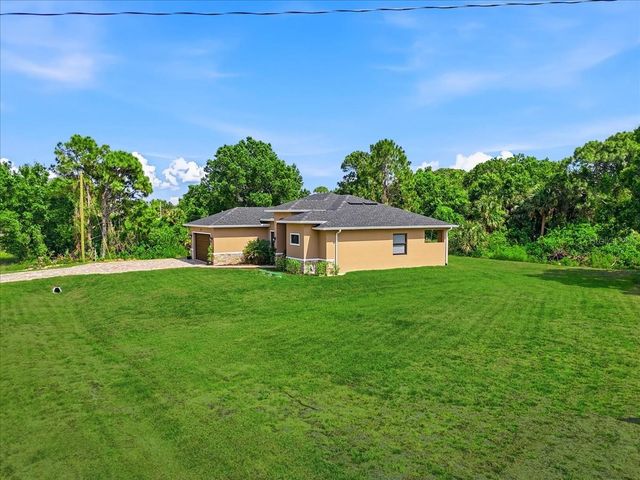 810 SENTINELA BOULEVARD, Lehigh Acres, FL 33974