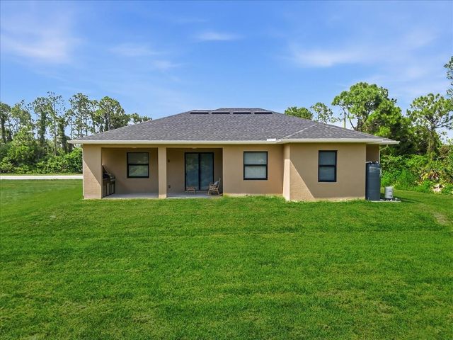 810 SENTINELA BOULEVARD, Lehigh Acres, FL 33974
