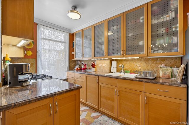 84-40 63rd Road, Middle Village, NY 11379