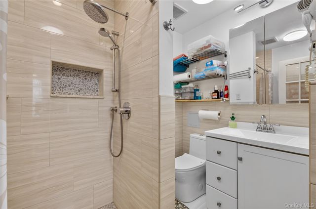 84-40 63rd Road, Middle Village, NY 11379