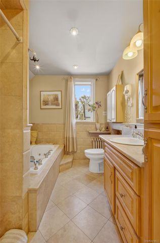 84-40 63rd Road, Middle Village, NY 11379