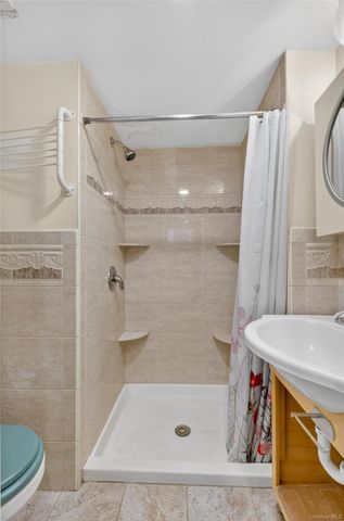 84-40 63rd Road, Middle Village, NY 11379