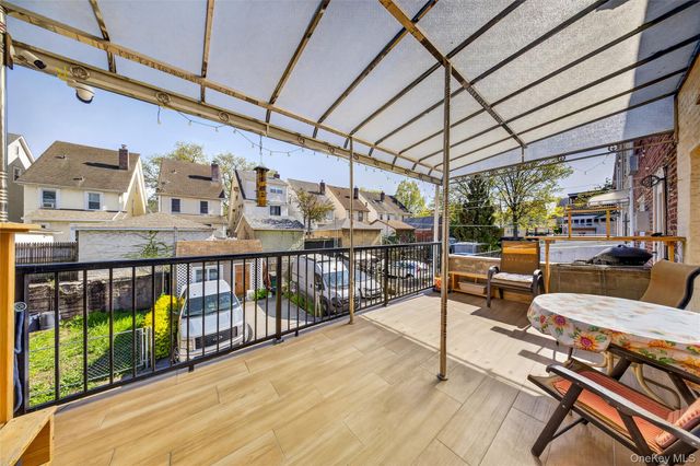 84-40 63rd Road, Middle Village, NY 11379