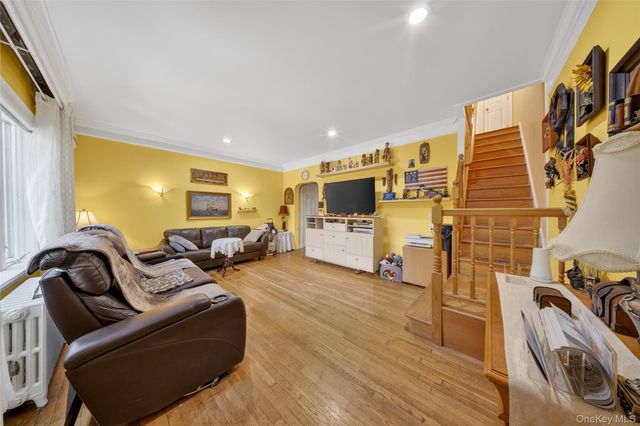 84-40 63rd Road, Middle Village, NY 11379