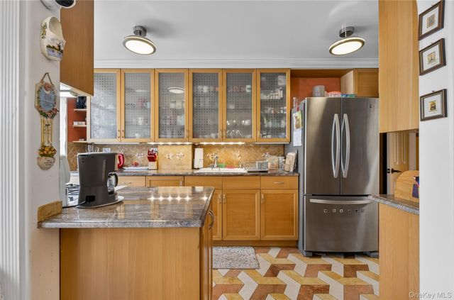 84-40 63rd Road, Middle Village, NY 11379