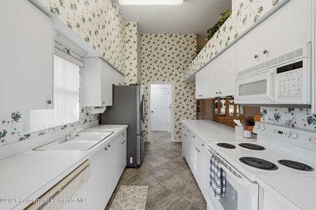 7354 Woodhollow Road, Spring Hill, FL 34606