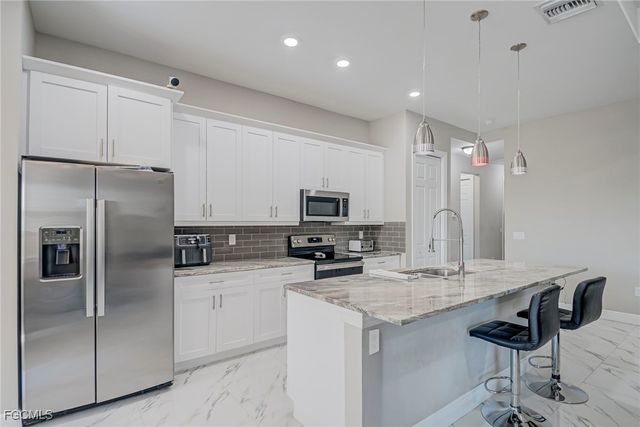 3309 30th ST SW, Lehigh Acres, FL 33976