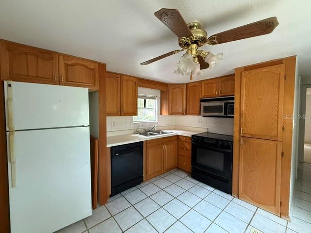 27416 WALNUT AVENUE, Okahumpka, FL 34762