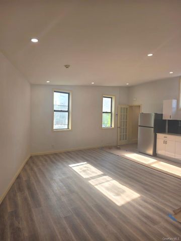 70-28 45th Avenue, Woodside, NY 11377