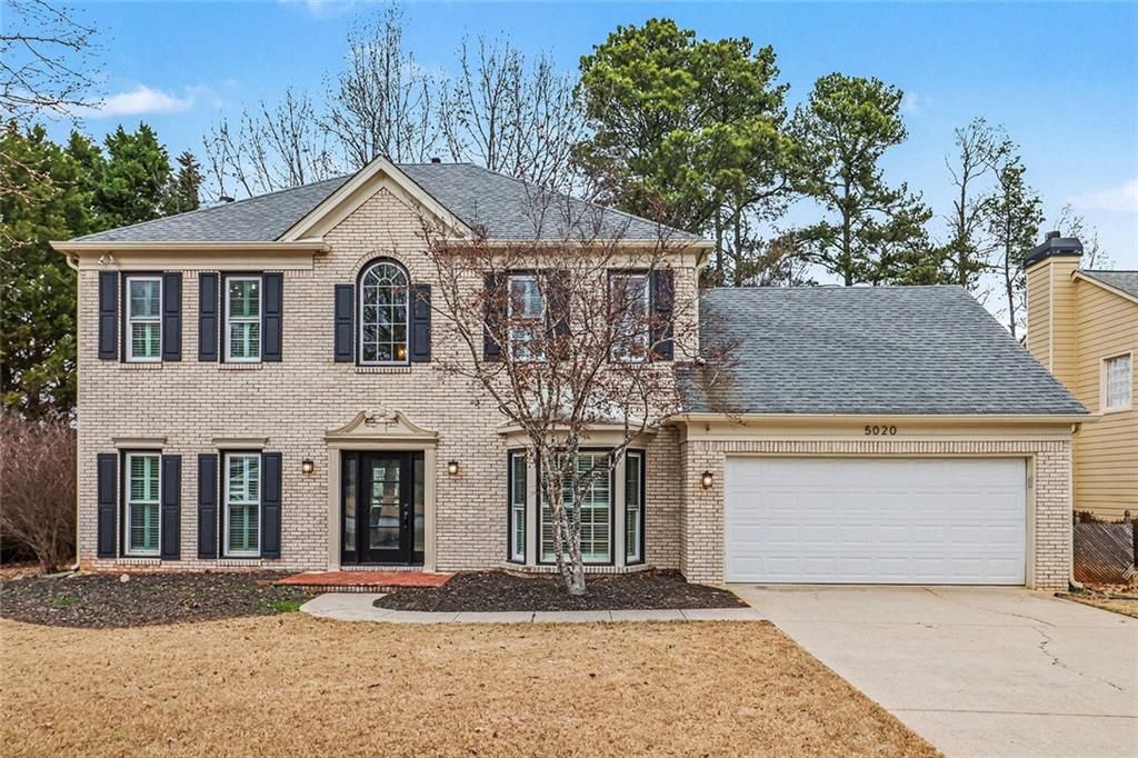 Image 1 of property listing at 5020 Cinnabar Drive, Johns Creek, GA 30022
