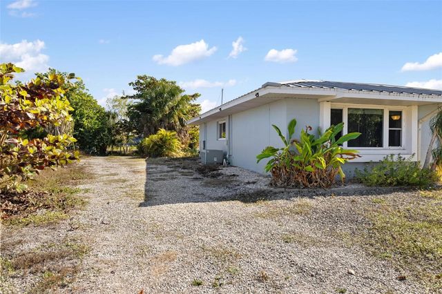 105 COUSLEY DRIVE SE, Port Charlotte, FL 33952