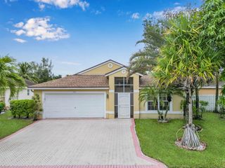 1784 Sawgrass Circle, Greenacres, FL 33413
