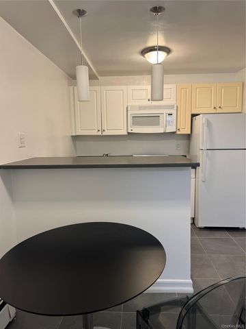 83-21 Lefferts Boulevard, Kew Gardens, NY 11415