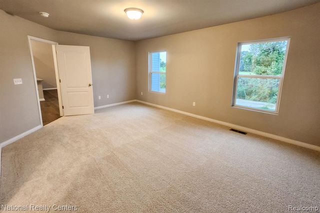 303 Devonshire Drive 7, Lapeer, MI 48446