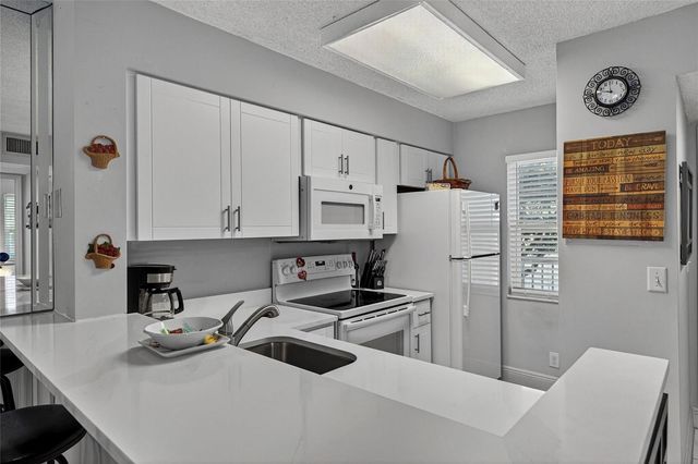 2222 N CYPRESS BEND Drive 201, Pompano Beach, FL 33069