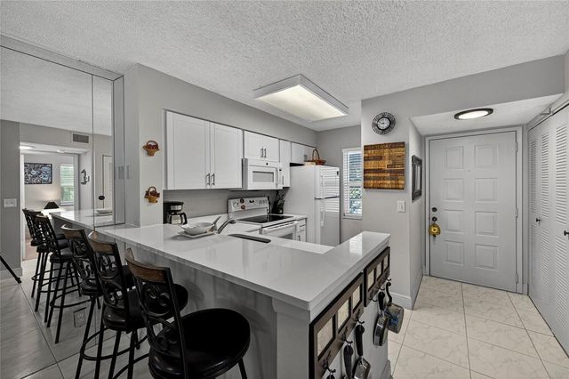 2222 N CYPRESS BEND Drive 201, Pompano Beach, FL 33069