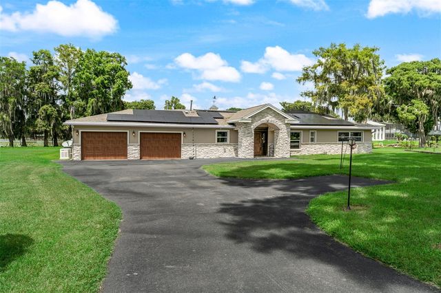 1002 LOVES POINT DRIVE, Leesburg, FL 34748