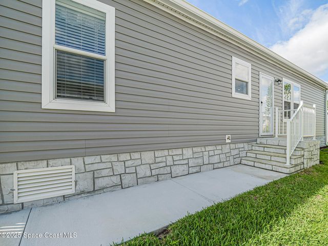623 Hyacinth Circle, Barefoot Bay, FL 32976