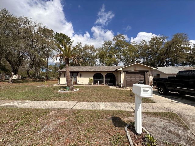 12805 PECAN TREE DRIVE, Hudson, FL 34669