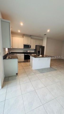 1128 LAKESHORE BREEZE PLACE, Kissimmee, FL 34747
