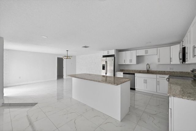 7104 KING ARTHUR DRIVE, Port Richey, FL 34668