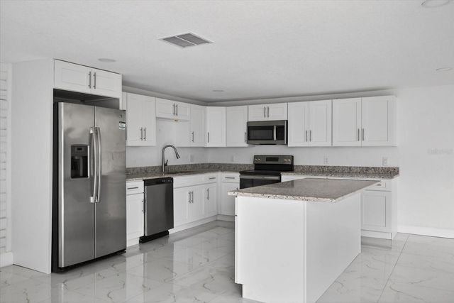 7104 KING ARTHUR DRIVE, Port Richey, FL 34668