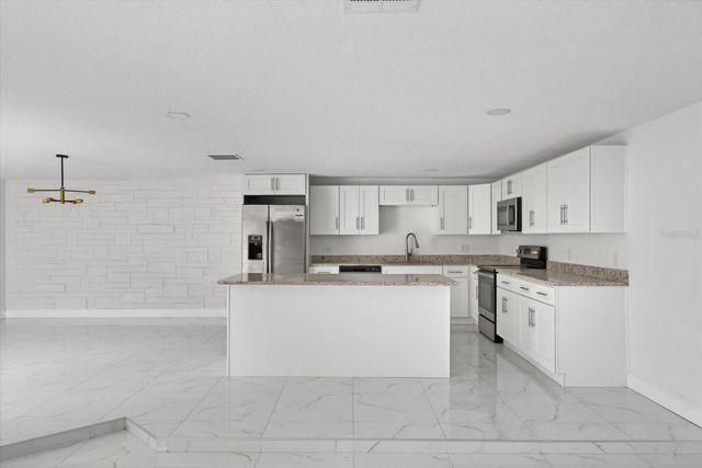 7104 KING ARTHUR DRIVE, Port Richey, FL 34668