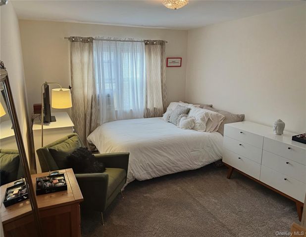 90-28 83rd Avenue, Glendale, NY 11385