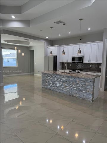 3013 4th ST W, Lehigh Acres, FL 33971