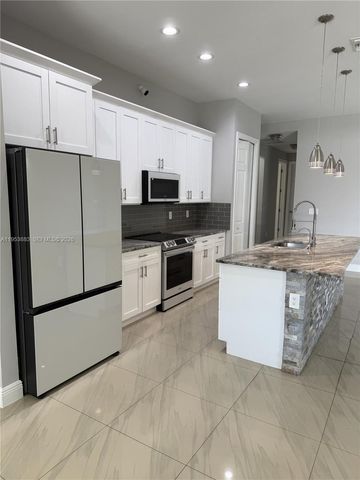 3013 4th ST W, Lehigh Acres, FL 33971