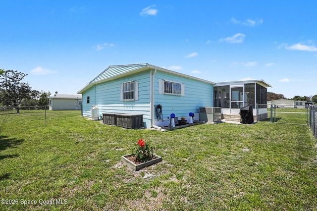823 Vireo Drive, Barefoot Bay, FL 32976