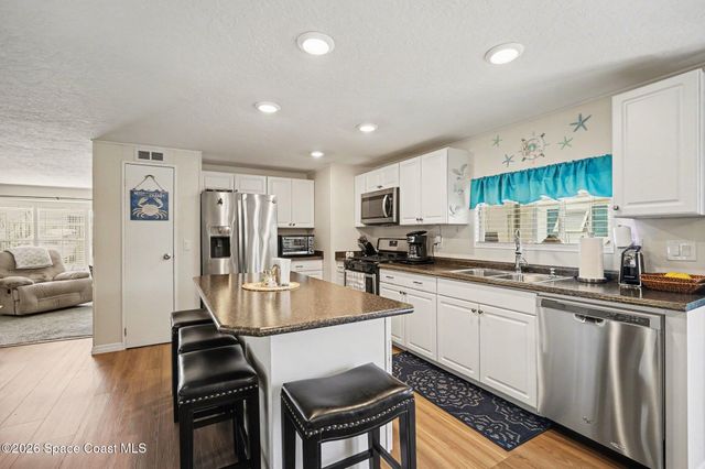 823 Vireo Drive, Barefoot Bay, FL 32976