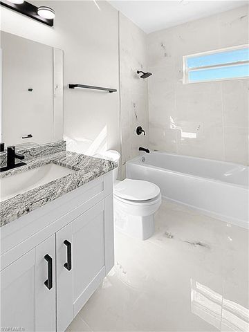 303 NW 26th AVE, Cape Coral, FL 33993