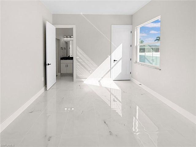 303 NW 26th AVE, Cape Coral, FL 33993