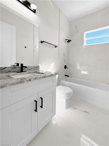 303 NW 26th AVE, Cape Coral, FL 33993