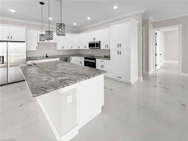 303 NW 26th AVE, Cape Coral, FL 33993